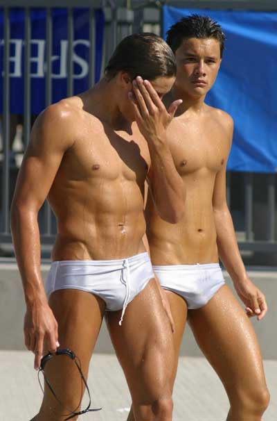 2 cuties in white speedos.